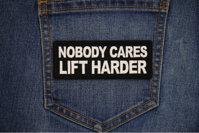 Nobody Cares Lift Harder Patch shown on jeans