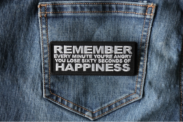 Remember Every Minute You're Angry You Lose Sixty Seconds of Happiness Patch shown on jeans