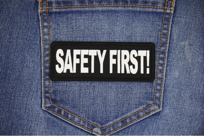 Safety First Patch shown on jeans