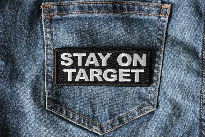 Stay on Target Patch shown on jeans