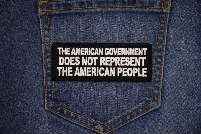 The American Government Does Not Represent The American People Patch shown on jeans
