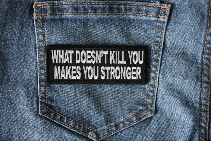 What Doesn't Kill You Makes You Stronger Patch shown on jeans