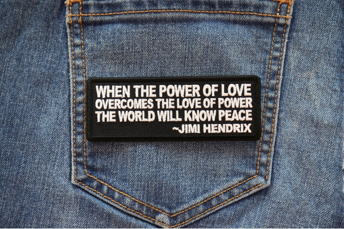 When The Power Of Love Overcomes the Love of Power The World Will Know Peace Patch shown on jeans