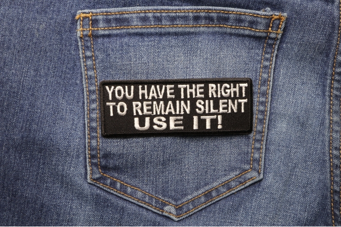 You Have The Right To Remain Silent Use It Iron on Patch shown on jeans