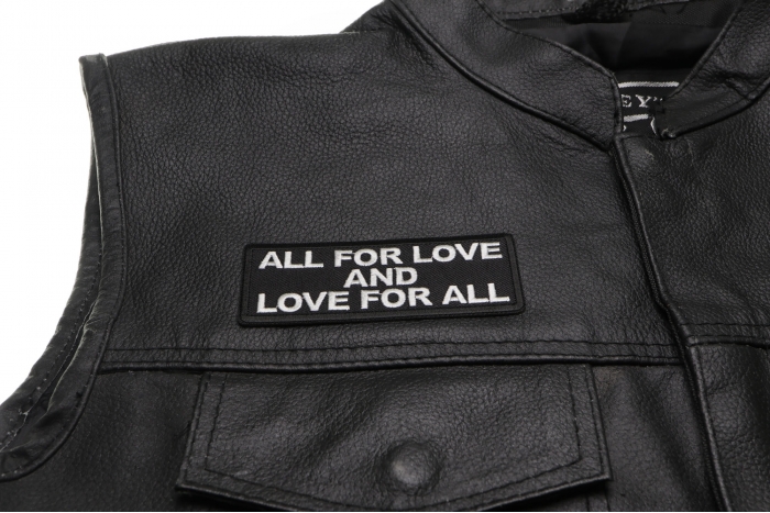 All for Love and Love for All Patch - 4x1.5 inch. Embroidered Iron on Patch shown on leather vest