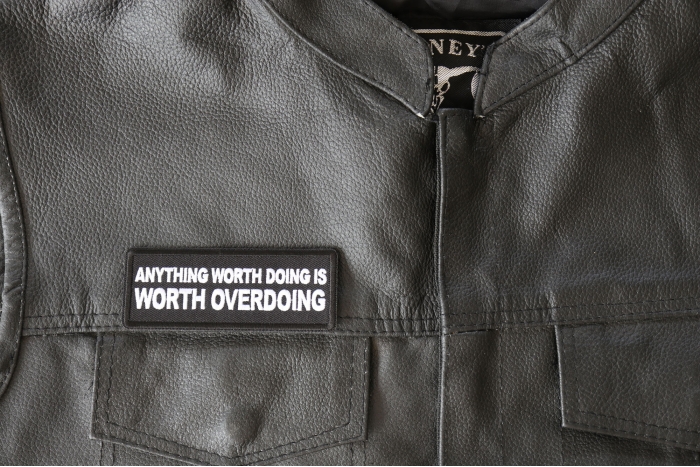 Anything Worth Doing is Worth Overdoing Patch, Funny Saying Patches shown on leather vest