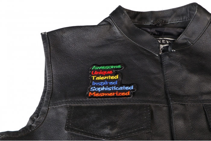 Autism Patch - 3.3x3 inch. Embroidered Iron on Patch shown on leather vest