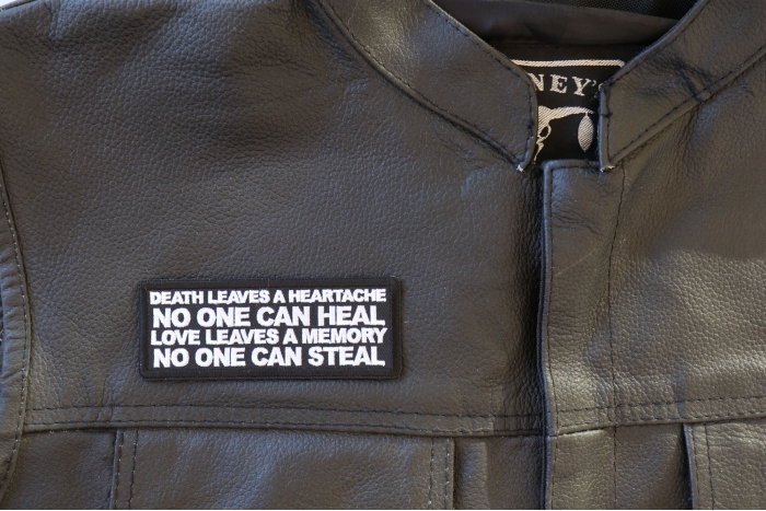 Death Leaves a Heartache No One Can Heal Love Leaves a Memory no One Can Steal Patch - 4x1.5 inch - Embroidered Iron on Patch shown on leather vest