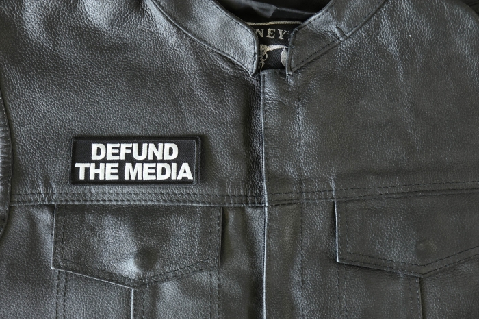 Defund the Media Patch - 4x1.5 inch - Embroidered Iron on Patch shown on leather vest
