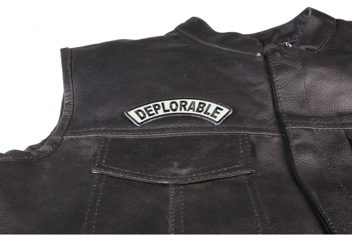 Deplorable Rocker Patch - 4x1 inch. Embroidered Iron on Patch shown on leather vest