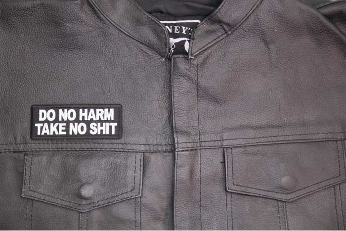 Do no Harm Take no Shit Patch, Biker Sayings shown on leather vest