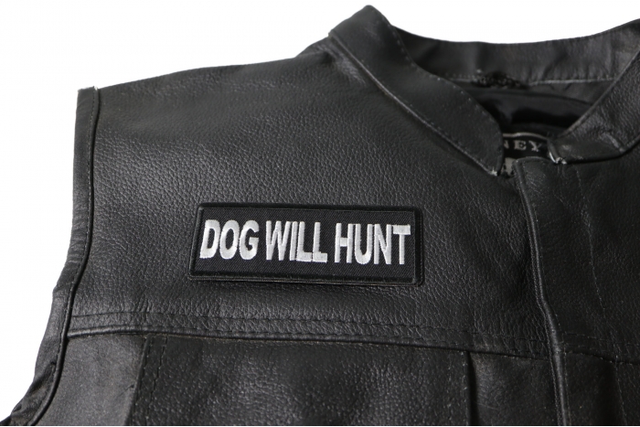 Dog Will Hunt Patch - 4x1.5 inch. Embroidered Iron on Patch shown on leather vest