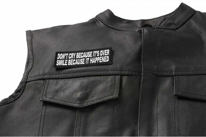 Don't Cry Because It's Over Smile Because It Happened Patch - 4x1.5 inch. Embroidered Iron on Patch shown on leather vest