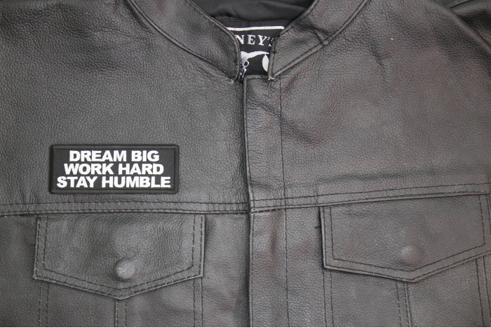 Dream Big Work Hard Stay Humble Patch shown on leather vest