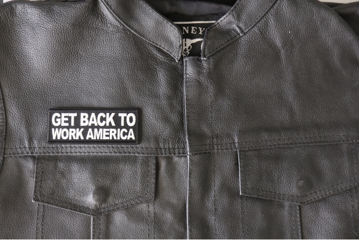 Get Back to Work America Patch - 4x1.5 inch - Embroidered Iron on Patch shown on leather vest