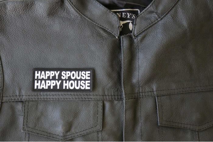Happy Spouse Happy House Patch - 4x1.5 inch - Embroidered Iron on Patch shown on leather vest