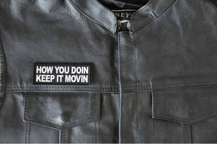 How you doin Keep it movin Patch - 4x1.5 inch - Embroidered Iron on Patch shown on leather vest