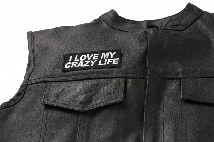 I Love My Crazy Life Patch - 4x1.5 inch. Embroidered Iron on Patch shown on leather vest