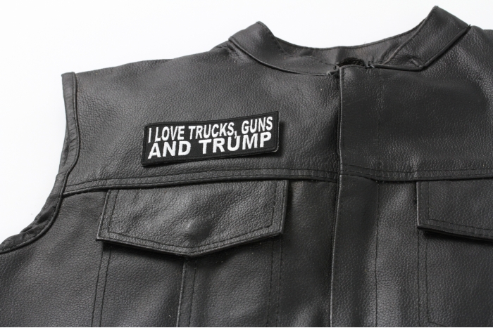 I Love Trucks, Guns and Trump Patch - 4x1.5 inch. Embroidered Iron on Patch shown on leather vest