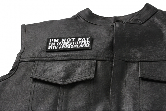 I'm Not Fat I'm Overstuffed With Awesomeness Patch - 4x1.5 inch. Embroidered Iron on Patch shown on leather vest