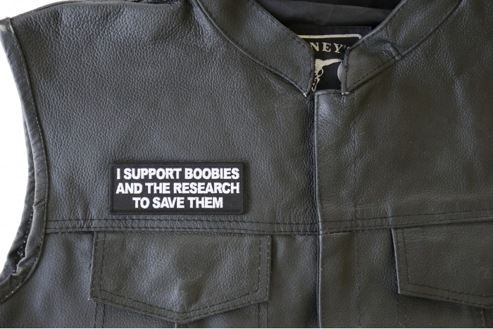 I support Boobies and The Research To Save Them Patch, Funny Saying Patches shown on leather vest