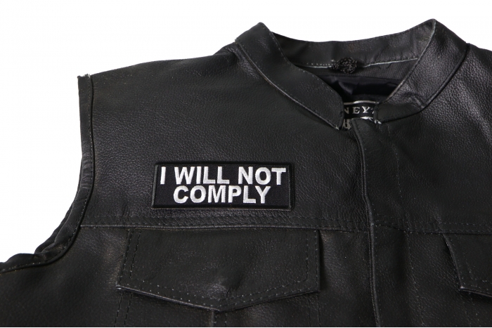I Will not Comply Patch - 4x1.5 inch. Embroidered Iron on Patch shown on leather vest