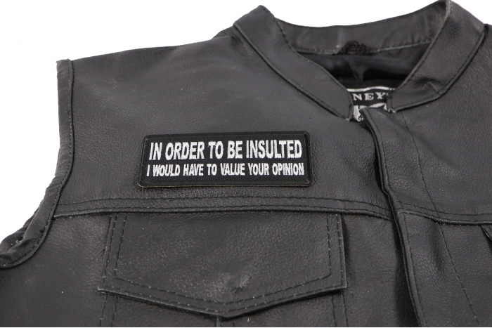 in Order to Be Insulted I Would gave to Value Your Opinion Patch - 4x1.5 inch. Embroidered Iron on Patch shown on leather vest