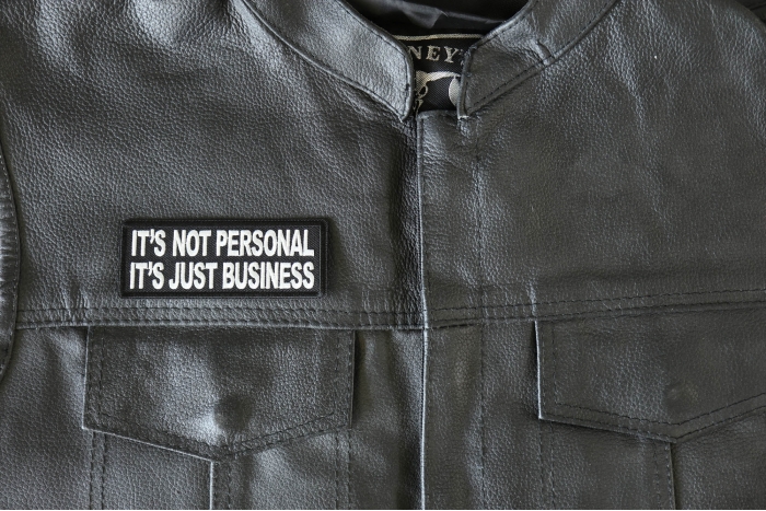 It's Not Personal It's Just Business Patch - 4x1.5 inch - Embroidered Iron on Patch shown on leather vest