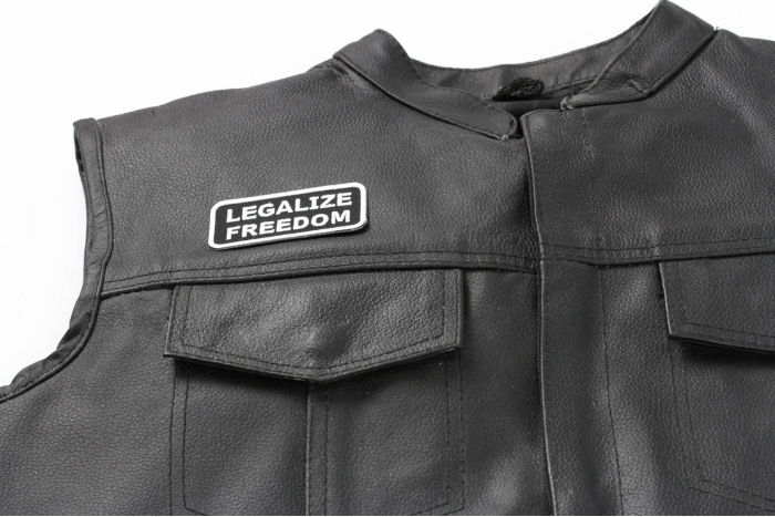 Legalize Freedom Patch - 3x1.25 inch. Embroidered Iron on Patch shown on leather vest