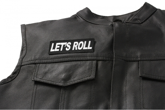 Let's Roll Patch - 4x1.5 inch. Embroidered Iron on Patch shown on leather vest