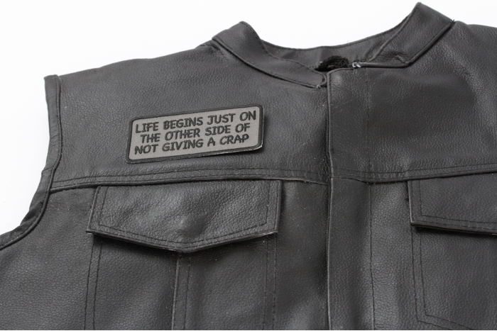 Life Begins Just On The Other Side Of Not Giving A Crap Patch - Iron on Patch - 4x2 inch shown on leather vest