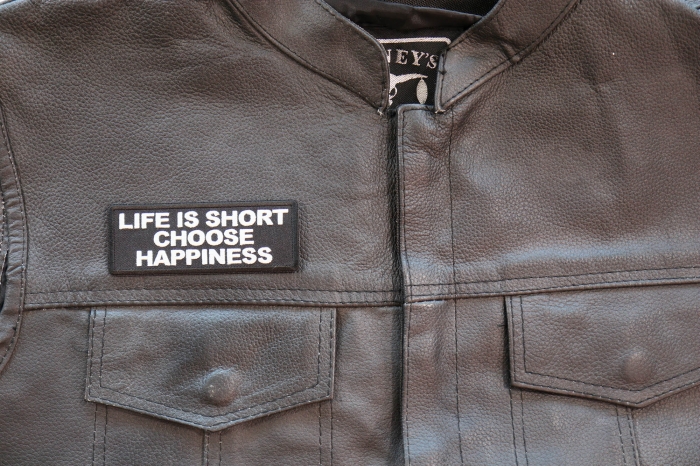 Life is Short Choose Happiness Patch shown on leather vest