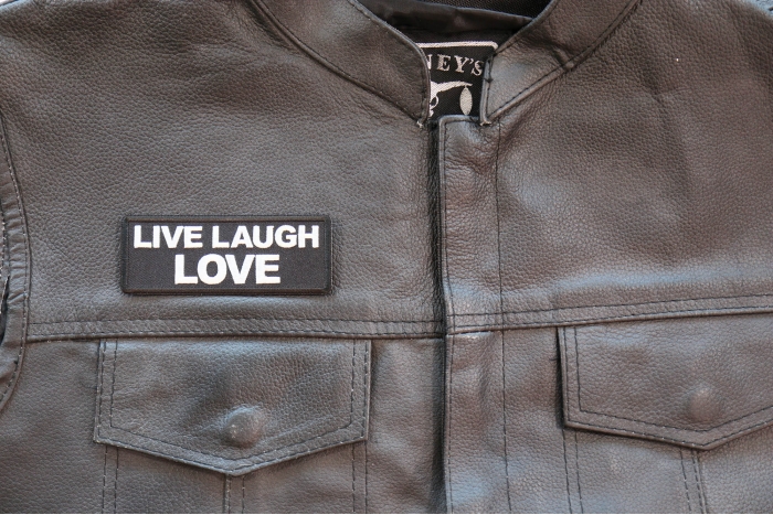 Live Laugh Love Patch shown on leather vest