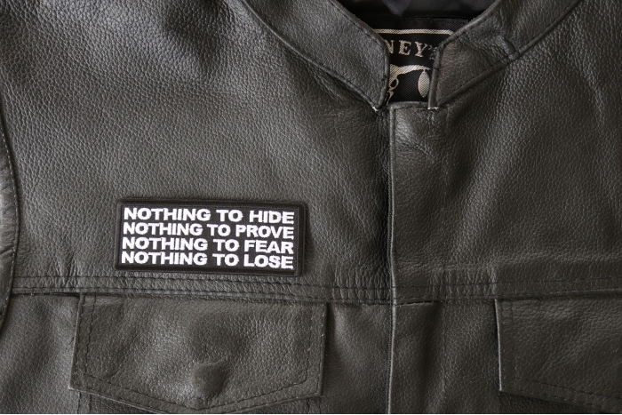 Nothing to Hide Prove Fear Lose Patch - 4x1.5 inch - Embroidered Iron on Patch shown on leather vest