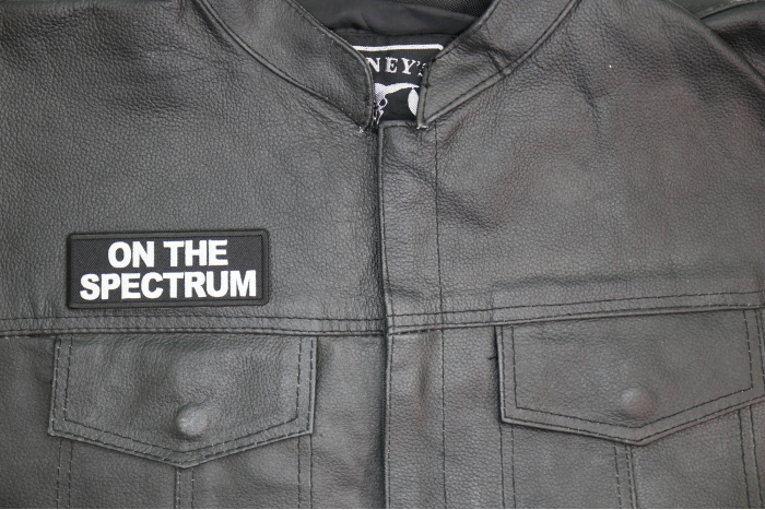 On The Spectrum Patch, Funny Saying Patches, Sew or Iron on Patch shown on leather vest