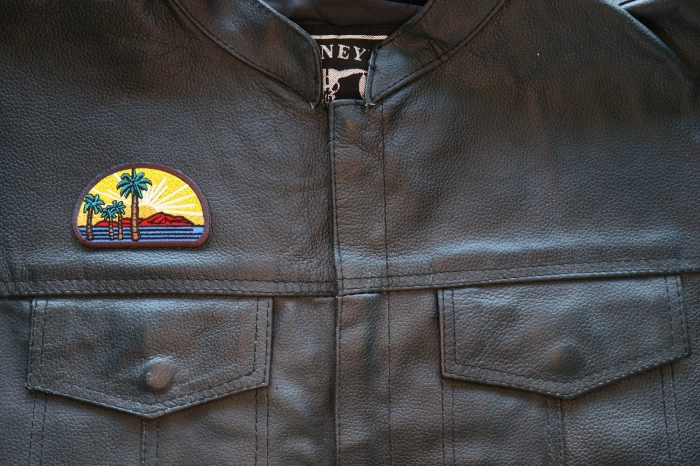 Palms and Sunset Iron on Patch shown on leather vest