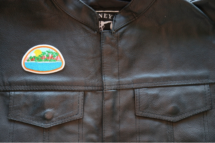 Paradise Island Iron on Patch shown on leather vest