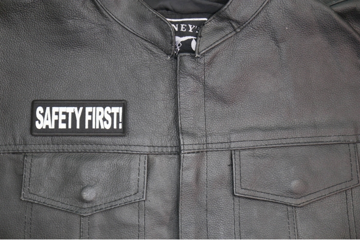 Safety First Patch shown on leather vest