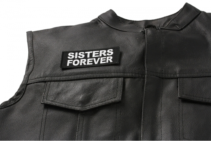 Sisters Forever Patch - 4x1.5 inch. Embroidered Iron on Patch shown on leather vest