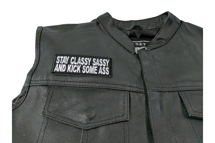 Stay Classy Sassy and Kick Some Ass Patch - 4x1.5 inch. Embroidered Iron on Patch shown on leather vest