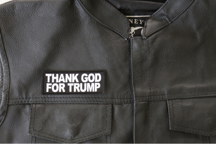 Thank God for Trump Patch - 4x1.5 inch. Embroidered Iron on Patch shown on leather vest