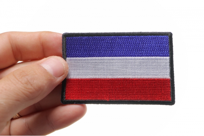 Dutch Flag Patch shown on hand for size comparison