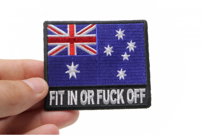 Fit In or Fuck Off Australian Flag Patch shown on hand for size comparison
