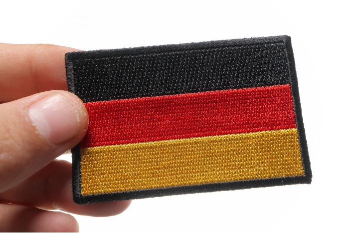German Flag Patch shown on hand for size comparison
