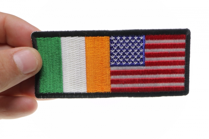 Irish American Flag Patch shown on hand for size comparison