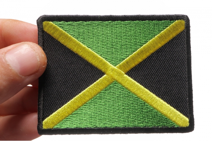 Jamaican Flag Small Patch shown on hand for size comparison