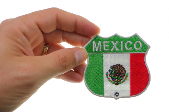 Mexico Shield Flag Patch shown on hand for size comparison