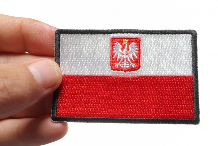 Poland Flag Patch shown on hand for size comparison