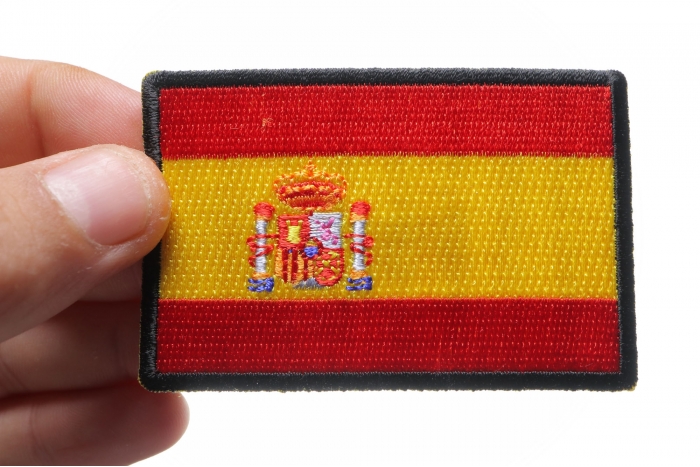 Spanish Flag Patch shown on hand for size comparison