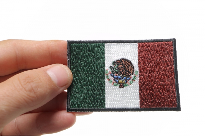 Subdued Mexico Flag Patch shown on hand for size comparison
